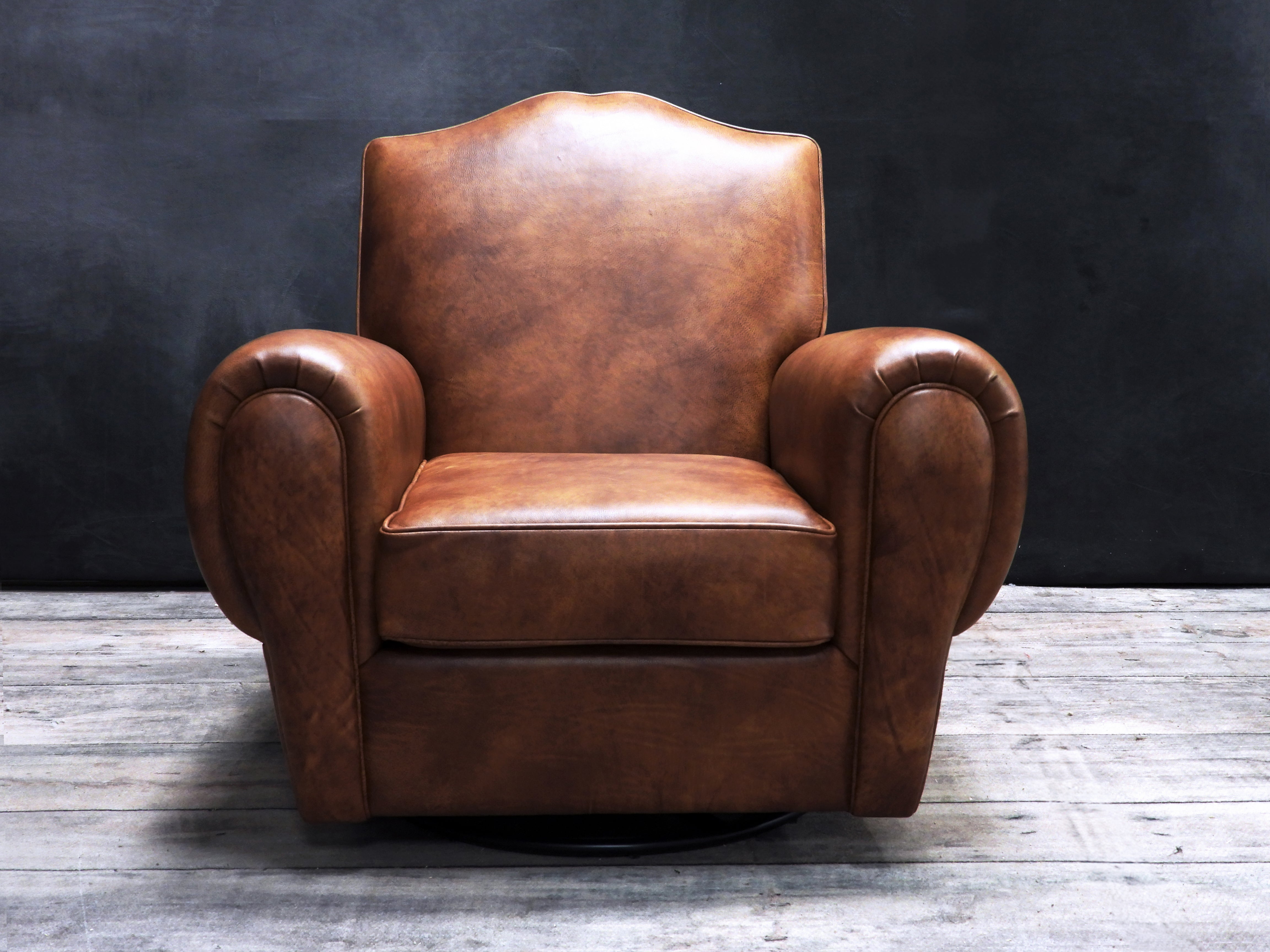 MOUSTACHE LEATHER CIGAR SWIVEL CHAIR