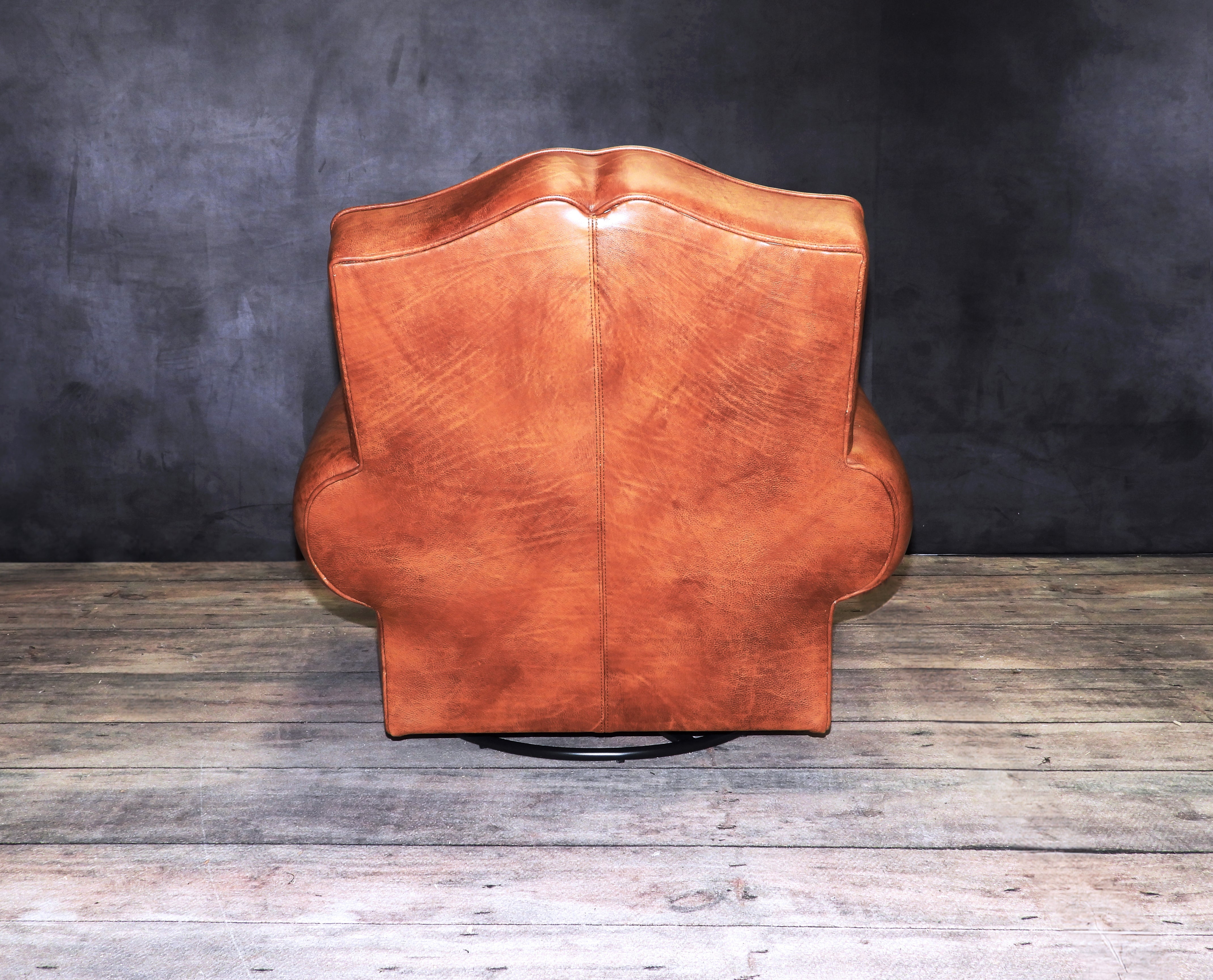 MOUSTACHE LEATHER CIGAR SWIVEL CHAIR