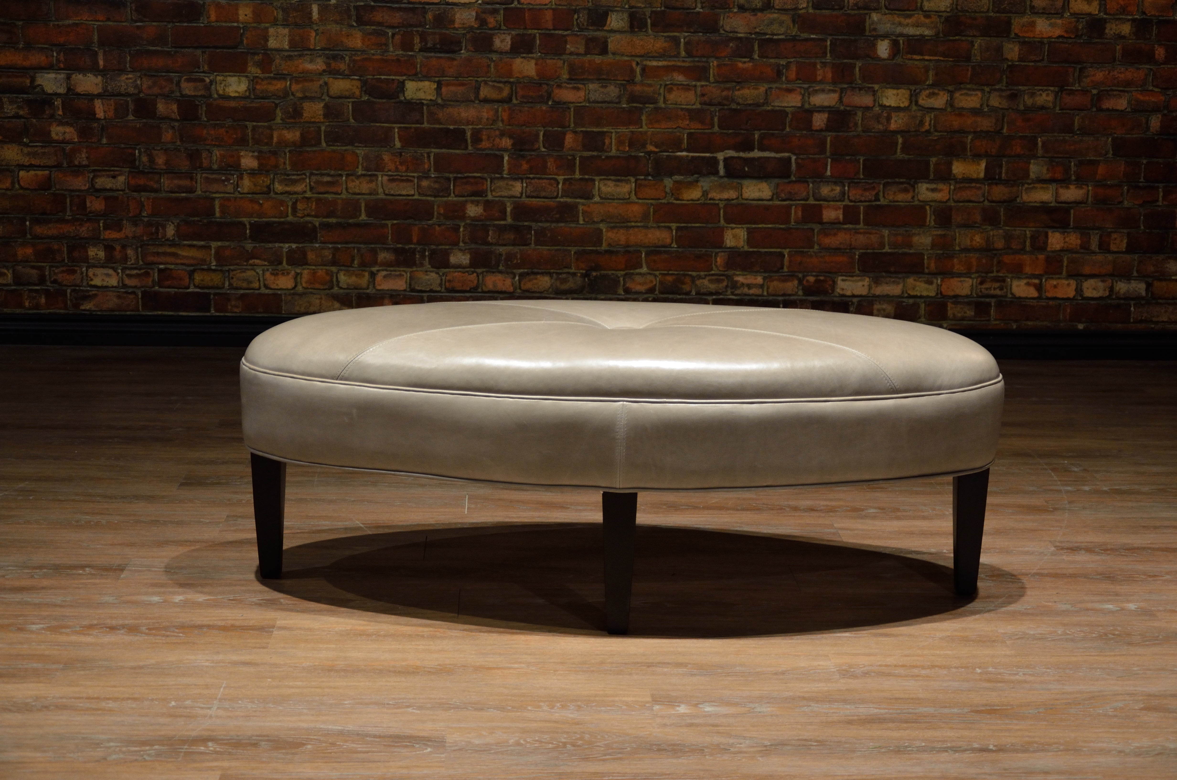 VIOLET OVAL LEATHER OTTOMAN